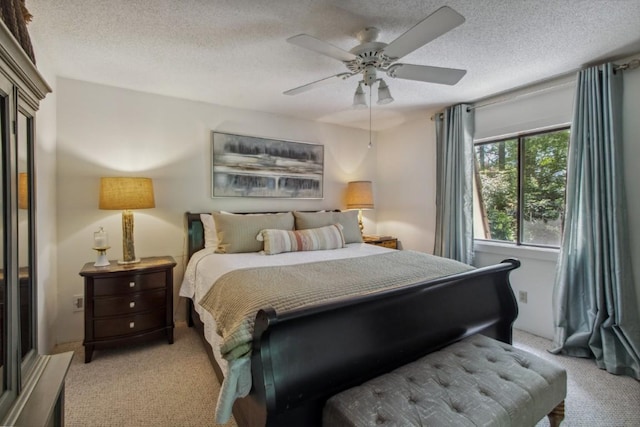 15 Elm Ct, Highlands, NC 28741 - bedroom featuring light colored carpet, a textured ceiling, and a ceiling fan