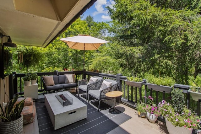15 Elm Ct, Highlands, NC 28741 - deck with an outdoor living space with a fire pit