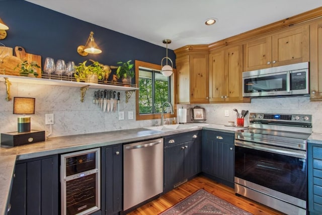 15 Elm Ct, Highlands, NC 28741 - kitchen featuring stainless steel appliances, beverage cooler, light wood-style flooring, open shelves, and backsplash