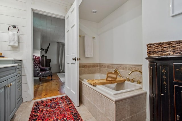 15 Elm Ct, Highlands, NC 28741 - full bath featuring a bath, lofted ceiling, vanity, and tile patterned flooring
