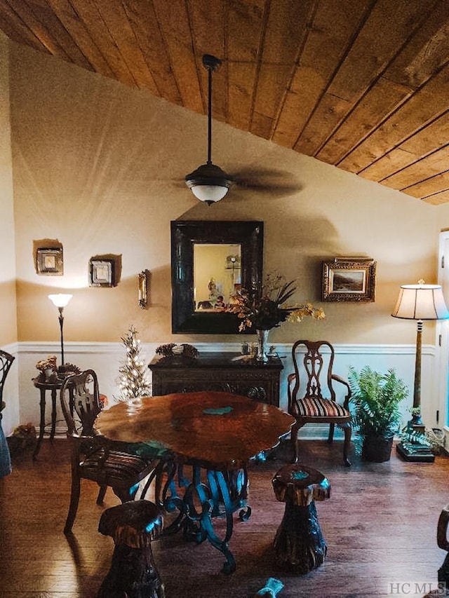 dining space featuring lofted ceiling, wood ceiling, and hardwood / wood-style flooring