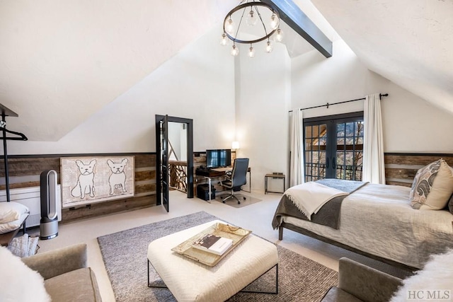 bedroom featuring a notable chandelier, high vaulted ceiling, french doors, and beamed ceiling