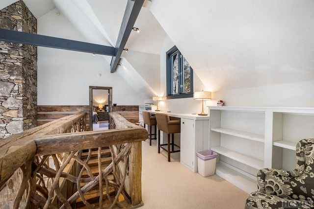 bar with vaulted ceiling and light carpet