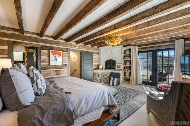 bedroom with beamed ceiling, a notable chandelier, wooden walls, and french doors