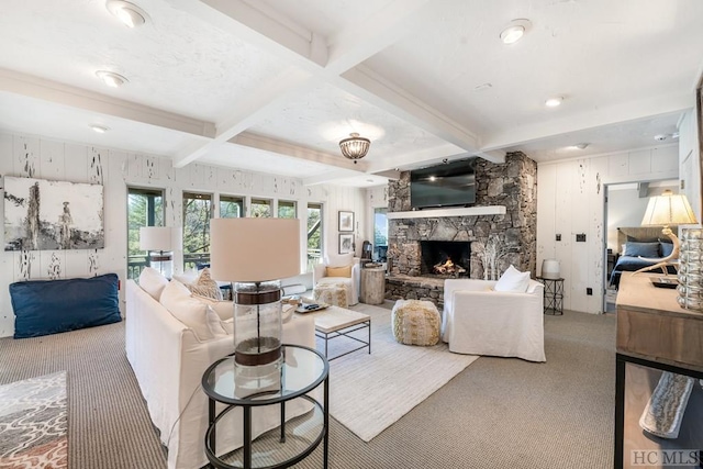 living room featuring carpet, coffered ceiling, a fireplace, and beam ceiling