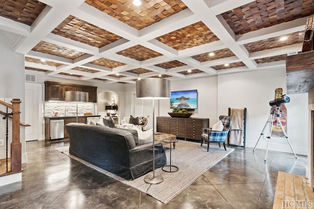 living room with coffered ceiling and beam ceiling