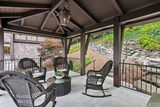 view of patio / terrace with a gazebo and an outdoor hangout area