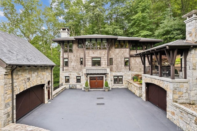 view of patio with an outdoor stone fireplace