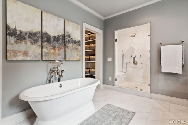 bathroom featuring ornamental molding and shower with separate bathtub