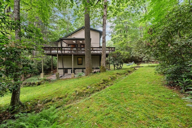 145 Mount Lori Dr, Highlands, NC 28741 - rear view of house featuring a deck and a yard