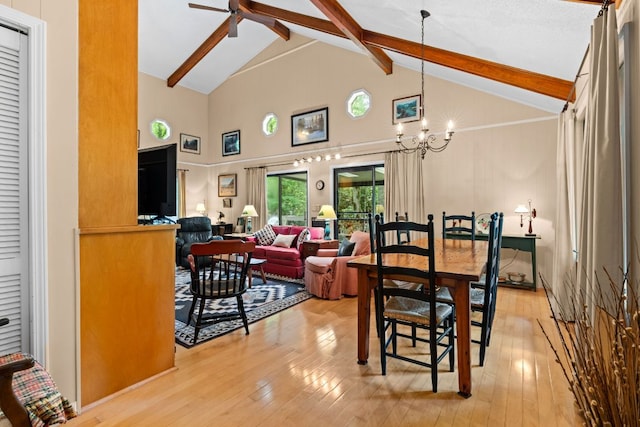 145 Mount Lori Dr, Highlands, NC 28741 - dining space with high vaulted ceiling, beam ceiling, light wood-type flooring, a ceiling fan, and a chandelier