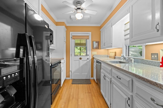 145 Mount Lori Dr, Highlands, NC 28741 - kitchen with black appliances, a ceiling fan, ornamental molding, healthy amount of natural light, and light wood finished floors