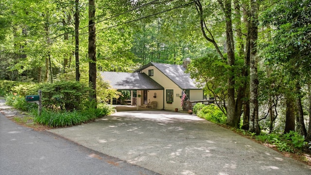 145 Mount Lori Dr, Highlands, NC 28741 - view of front of house featuring driveway and an attached carport