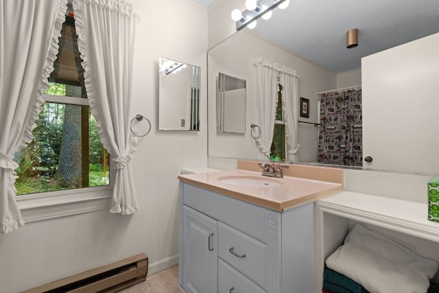 145 Mount Lori Dr, Highlands, NC 28741 - bathroom featuring a baseboard radiator and vanity