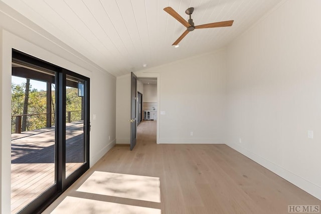 empty room featuring wood ceiling, ceiling fan, lofted ceiling, and light wood-type flooring