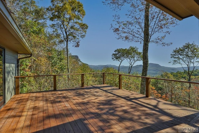 wooden terrace with a mountain view