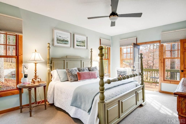 bedroom with light carpet and ceiling fan