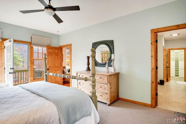 bedroom featuring access to exterior, ceiling fan, and carpet flooring