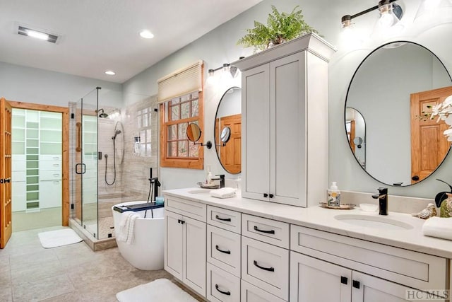 bathroom featuring plus walk in shower and vanity