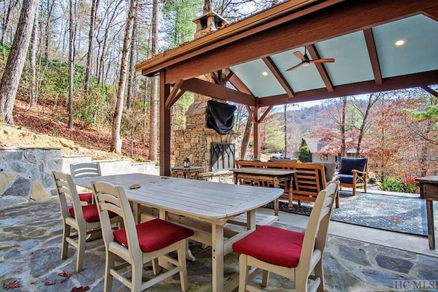 view of patio / terrace featuring a gazebo and ceiling fan