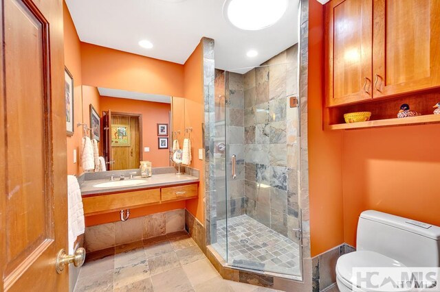 43 Chimney Pt, Lake Toxaway, NC 28747 - bathroom with a shower stall, vanity, and recessed lighting