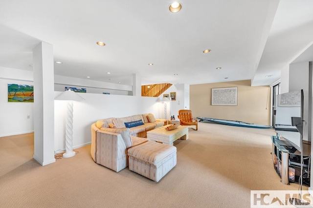43 Chimney Pt, Lake Toxaway, NC 28747 - living room with light colored carpet, recessed lighting, and stairway
