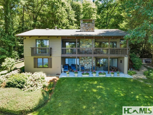 43 Chimney Pt, Lake Toxaway, NC 28747 - rear view of house featuring a patio area and a chimney