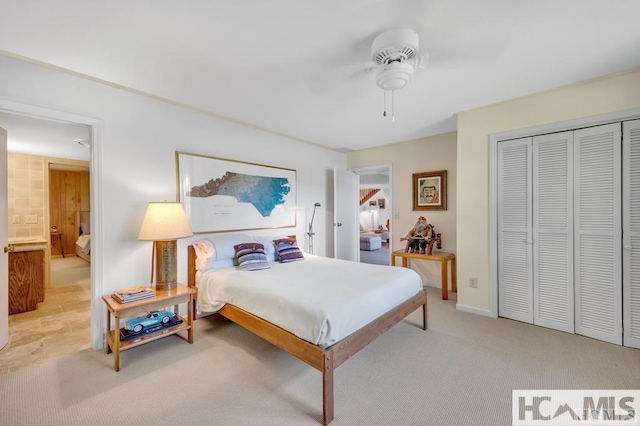 43 Chimney Pt, Lake Toxaway, NC 28747 - bedroom with a closet, a ceiling fan, and light colored carpet