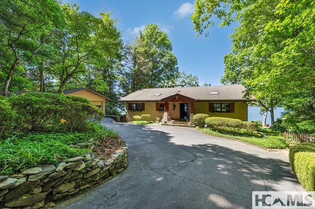 43 Chimney Pt, Lake Toxaway, NC 28747 - ranch-style home with an outbuilding and a garage