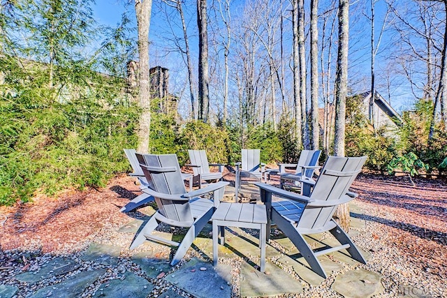 view of patio featuring an outdoor fire pit