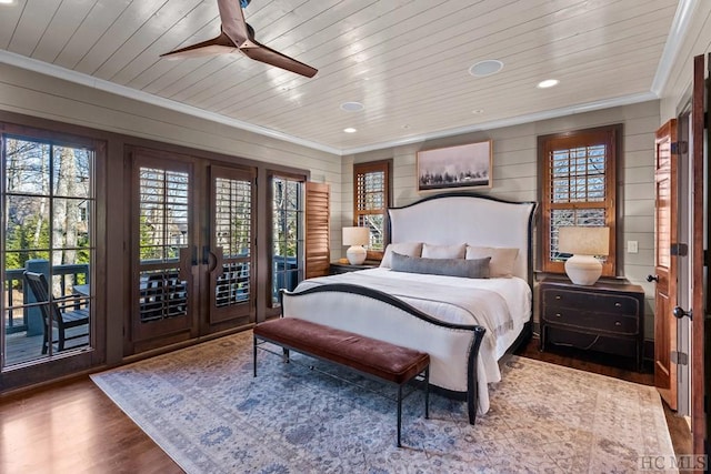 bedroom with access to exterior, crown molding, hardwood / wood-style floors, and ceiling fan