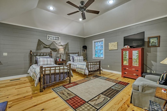 bedroom featuring visible vents, ceiling fan, vaulted ceiling, recessed lighting, and wood finished floors