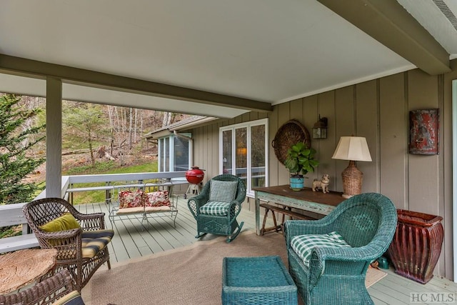 sunroom / solarium with beam ceiling