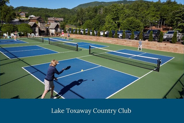 145 Island Point Rd, Lake Toxaway, NC 28747 - view of tennis court featuring community basketball court and a forest view