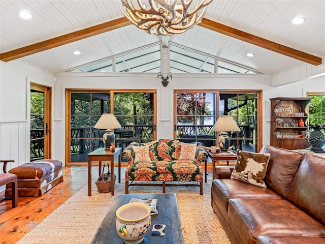 145 Island Point Rd, Lake Toxaway, NC 28747 - living area with a chandelier, hardwood / wood-style floors, recessed lighting, and a wainscoted wall