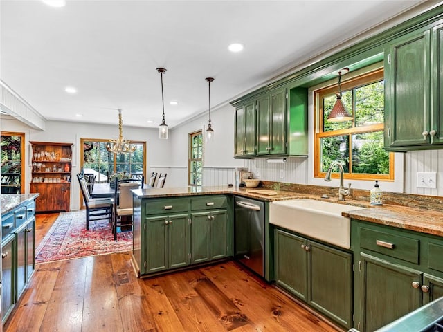 145 Island Point Rd, Lake Toxaway, NC 28747 - kitchen featuring green cabinetry, dishwasher, a sink, pendant lighting, and wainscoting