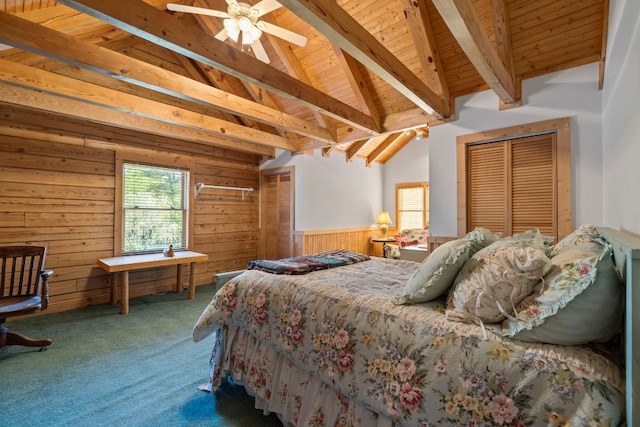 carpeted bedroom with wood walls, wood ceiling, high vaulted ceiling, and beamed ceiling