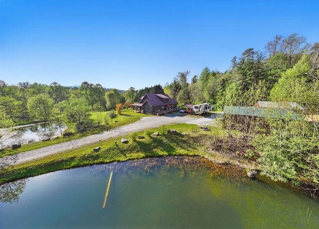 drone / aerial view featuring a water view