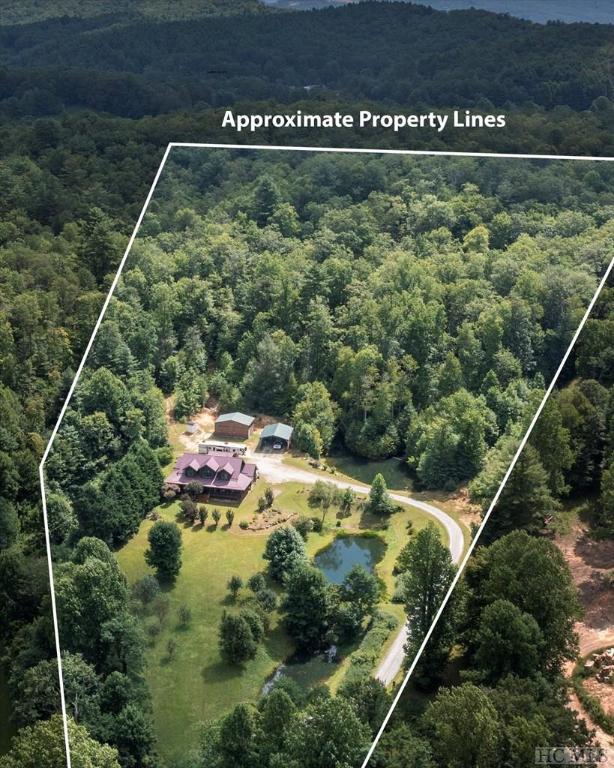drone / aerial view with a forest view