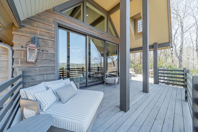 wooden deck with outdoor lounge area