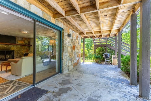 view of patio / terrace featuring stairway
