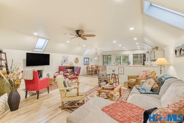 178 Whetstone Gap Rd, Lake Toxaway, NC 28747 - living area featuring a skylight, lofted ceiling, ceiling fan, light wood-type flooring, and recessed lighting