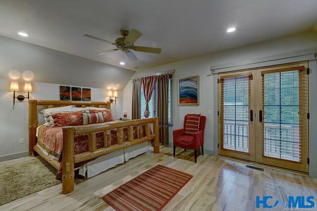 178 Whetstone Gap Rd, Lake Toxaway, NC 28747 - bedroom featuring access to exterior, wood finished floors, multiple windows, recessed lighting, and lofted ceiling