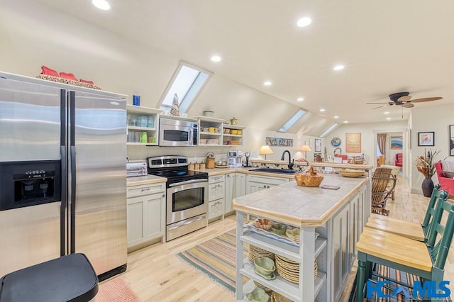 178 Whetstone Gap Rd, Lake Toxaway, NC 28747 - kitchen featuring open shelves, stainless steel appliances, a sink, a peninsula, and recessed lighting