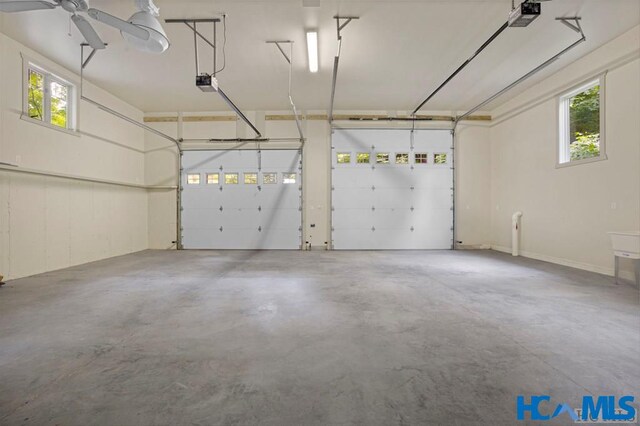 178 Whetstone Gap Rd, Lake Toxaway, NC 28747 - garage featuring a garage door opener and ceiling fan
