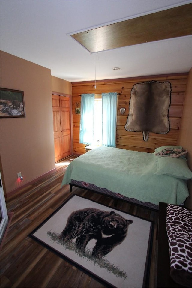 bedroom with wood finished floors