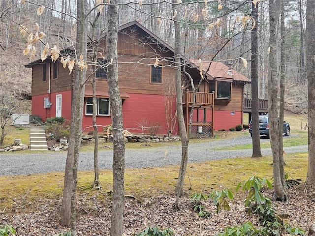 exterior space featuring a wooden deck