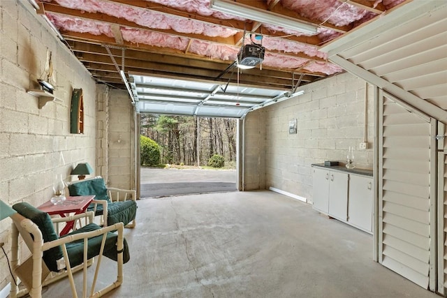 165 Hawks Nest Ln Unit 5, Highlands, NC 28741 - garage featuring concrete block wall and a garage door opener