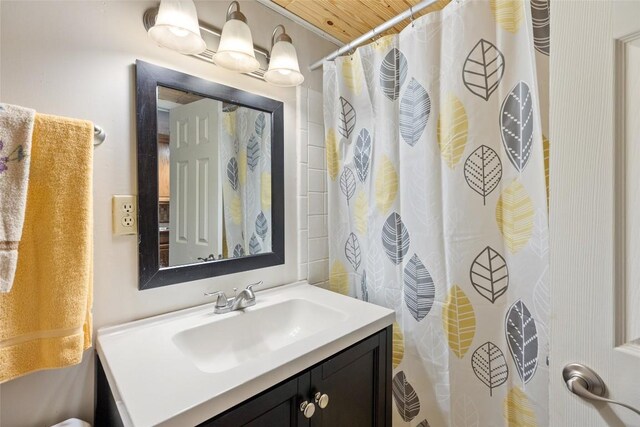 165 Hawks Nest Ln Unit 5, Highlands, NC 28741 - bathroom with a shower with curtain, vanity, and wood ceiling