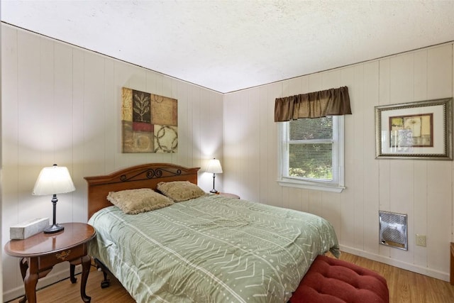 165 Hawks Nest Ln Unit 5, Highlands, NC 28741 - bedroom with baseboards and wood finished floors